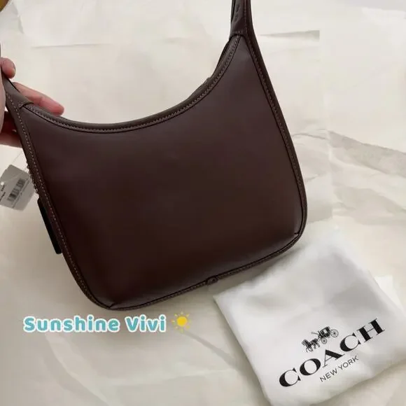 NWT Coach Curve Zip Bag in BRASS/Maple Glovetanned Leather CAF11